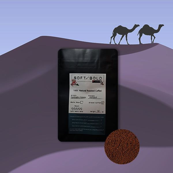 10oz bag of Soft Meets Bold specialty Yemen coffee, ground roast, displayed with a desert-inspired background featuring camels.