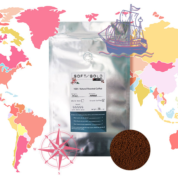 16oz silver bag of Soft Meets Bold specialty coffee, displayed against a colorful world map with a vintage ship illustration.