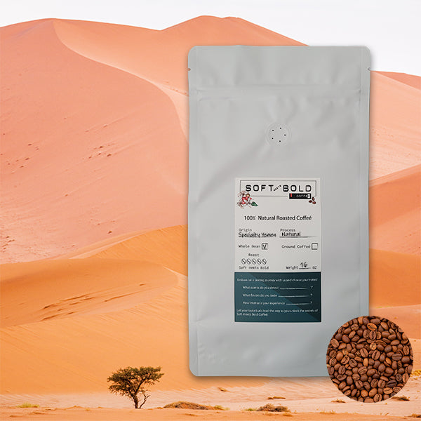 16oz bag of Soft Meets Bold Yemen specialty coffee, placed against a desert landscape with sand dunes and an acacia tree.