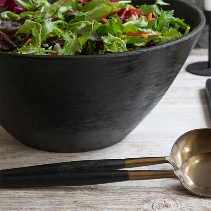 Large black mango wood serving bowl filled with salad – rustic modern kitchen decor